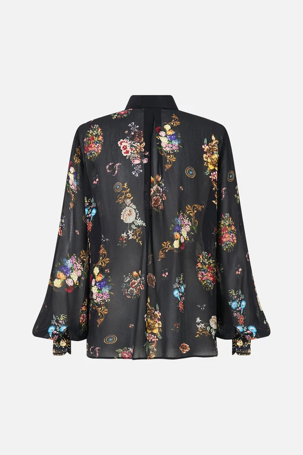 floral-print ruffled blouse